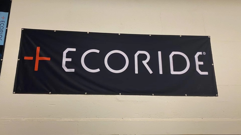 Banner, W300 H100, Ecoride logo, logo white, background black, holes for attachments